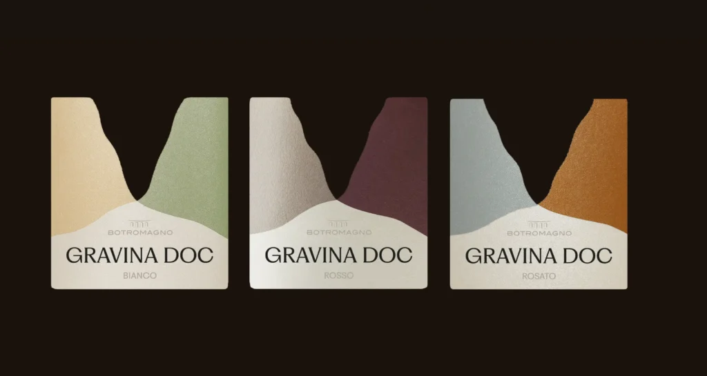 Sistema di etichette Gravina DOC Botromagno per vino bianco, rosso e rosato ispirato alla morfologia del territorio.